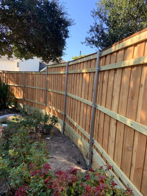 Steel-post cedar fence
